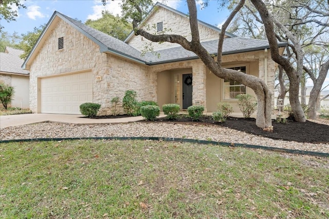 151 Dan Moody Trl, Georgetown, TX 78633 - view of front of property with stone siding, a garage, concrete driveway, and roof with shingles