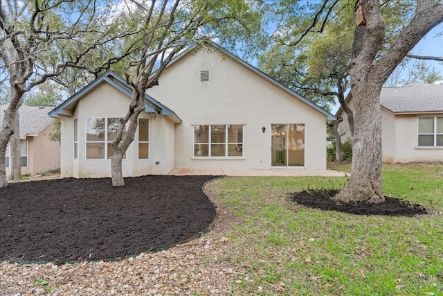 151 Dan Moody Trl, Georgetown, TX 78633 - rear view of house with stucco siding and a patio