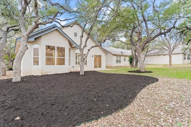 151 Dan Moody Trl, Georgetown, TX 78633 - rear view of house with stucco siding