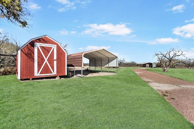 9475 N US Highway 377, Junction, TX 76849 - view of shed with a detached carport and driveway