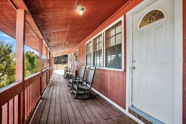 deck with covered porch