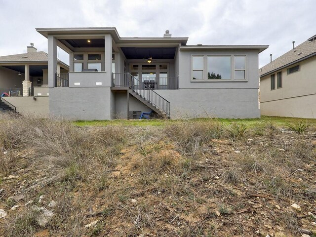 19516 Tranquility Falls Path, Lago Vista, TX 78645 - view of front of property featuring stairway and stucco siding