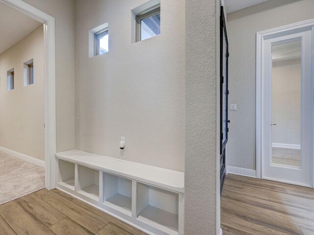 19516 Tranquility Falls Path, Lago Vista, TX 78645 - mudroom featuring wood finished floors and baseboards