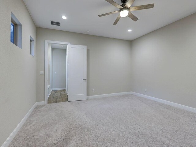 19516 Tranquility Falls Path, Lago Vista, TX 78645 - unfurnished room featuring light colored carpet, a ceiling fan, and recessed lighting