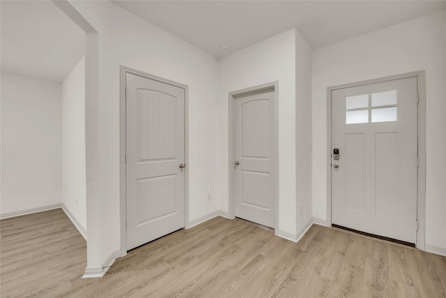 entrance foyer featuring light wood-type flooring