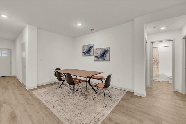 dining area featuring light hardwood / wood-style floors