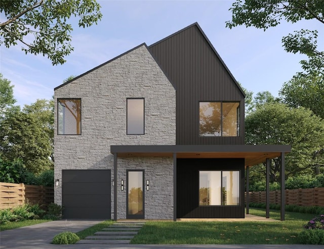 back of house featuring a lawn and a garage