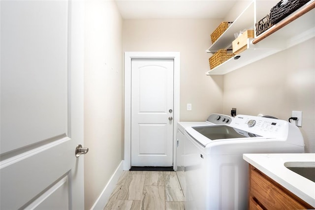 washroom featuring washing machine and clothes dryer