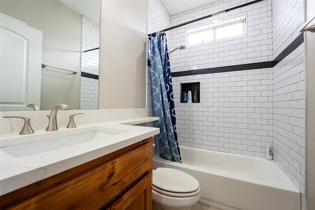 full bathroom featuring shower / bath combination with curtain, toilet, and vanity