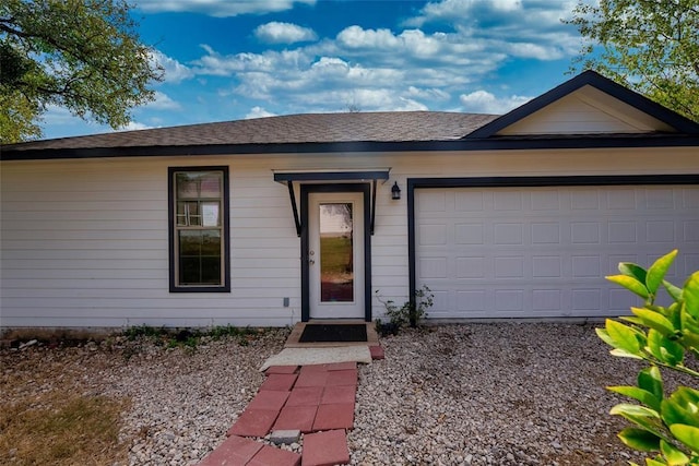 single story home with a garage