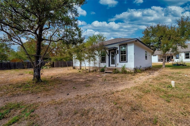 view of front of home with a front yard