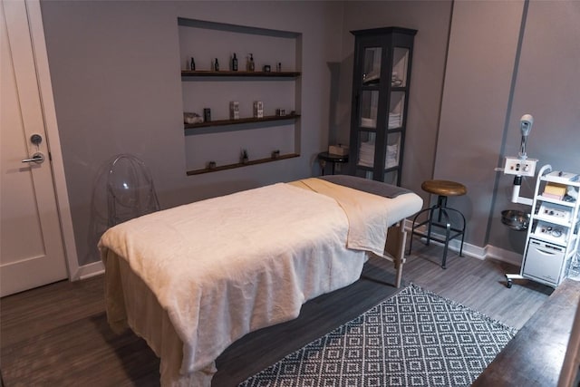4361 S Congress Ave Unit 106, Austin, TX 78745 - bedroom with wood finished floors and baseboards