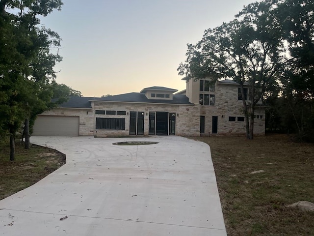 view of front of home with a garage