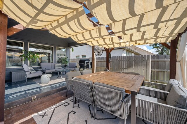 view of patio / terrace featuring an outdoor hangout area and a pergola