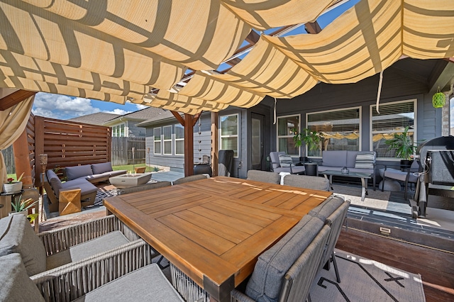 view of patio with an outdoor living space and a pergola