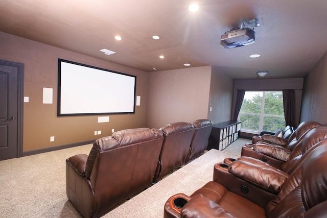 cinema room featuring carpet floors