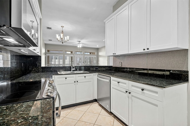 kitchen featuring white cabinetry, sink, stainless steel dishwasher, light tile patterned flooring, and range