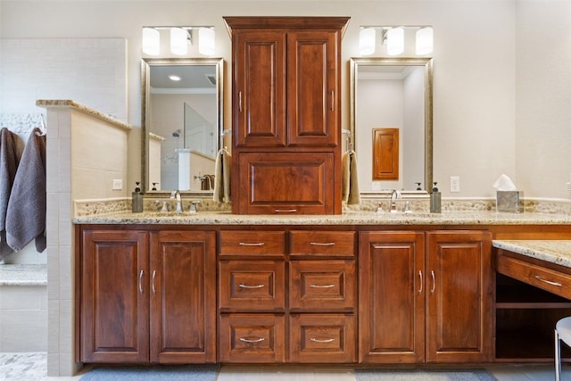 bathroom featuring vanity and ornamental molding