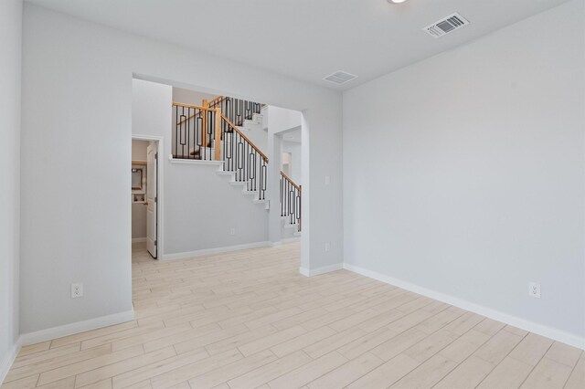 empty room with light wood-type flooring