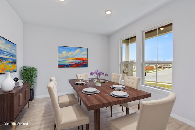 dining room featuring light wood-type flooring