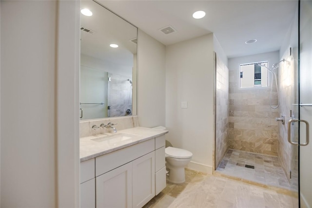 full bathroom with visible vents, a shower stall, and toilet