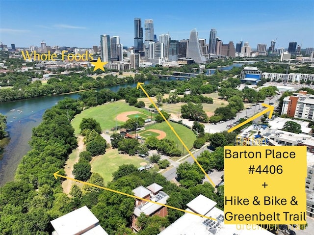 aerial view with a water view and a view of city