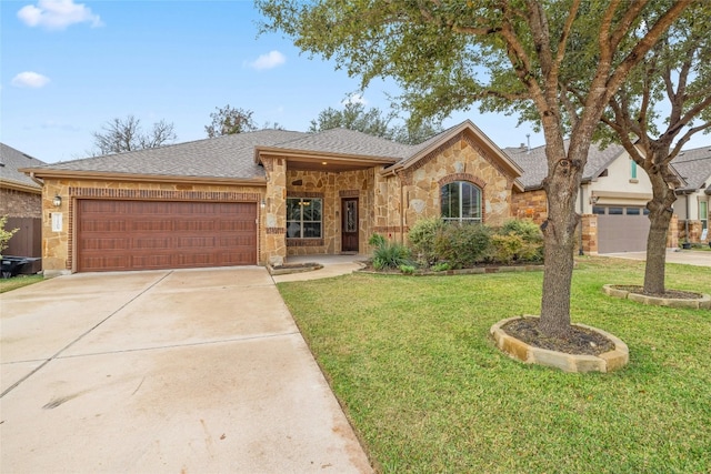 ranch-style house featuring a garage and a front lawn