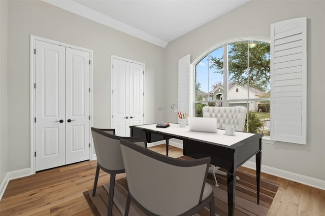 dining space featuring hardwood / wood-style flooring