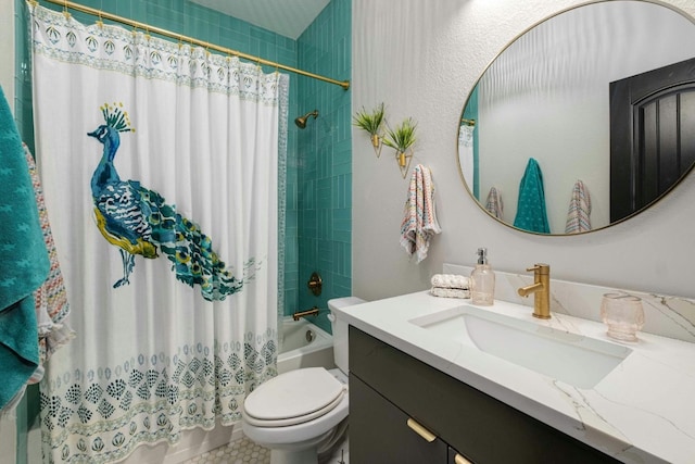 full bathroom with vanity, shower / bath combo, and toilet