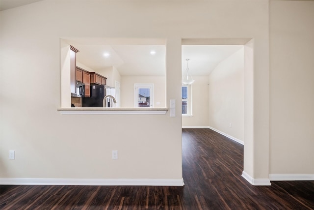 interior space with dark hardwood / wood-style flooring