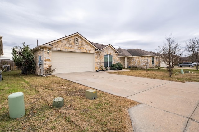 ranch-style house with a front lawn and a garage