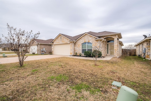 ranch-style home with a front yard and a garage