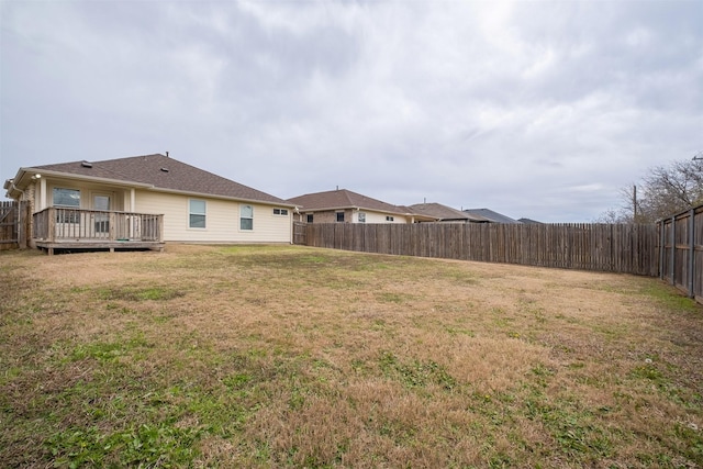 view of yard featuring a deck