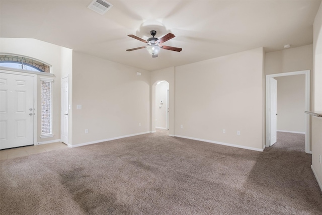 carpeted empty room with ceiling fan