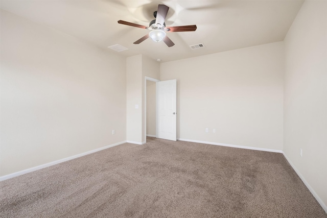 unfurnished room featuring ceiling fan and carpet flooring