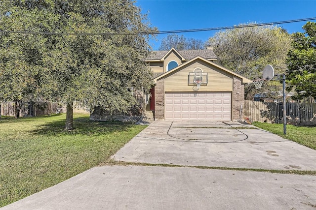 view of front facade with a garage and a front yard