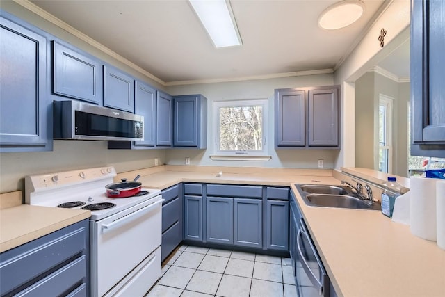 kitchen featuring blue cabinets, sink, light tile patterned floors, ornamental molding, and appliances with stainless steel finishes