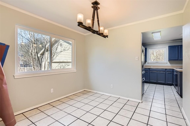 unfurnished dining area with light tile patterned floors, plenty of natural light, crown molding, and a notable chandelier