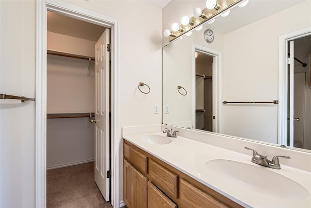 282 Spring River Dr, Martindale, TX 78655 - full bathroom featuring double vanity and a spacious closet
