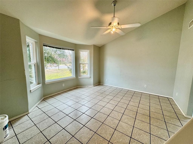 282 Spring River Dr, Martindale, TX 78655 - empty room with a ceiling fan, light tile patterned floors, and vaulted ceiling