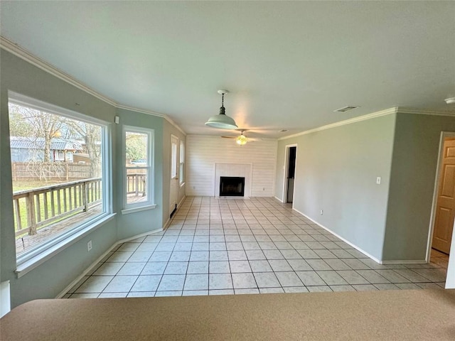 282 Spring River Dr, Martindale, TX 78655 - unfurnished living room featuring a fireplace, light tile patterned floors, ceiling fan, and ornamental molding