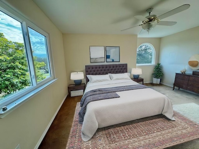 282 Spring River Dr, Martindale, TX 78655 - carpeted bedroom with baseboards and a ceiling fan