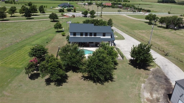 birds eye view of property featuring a rural view