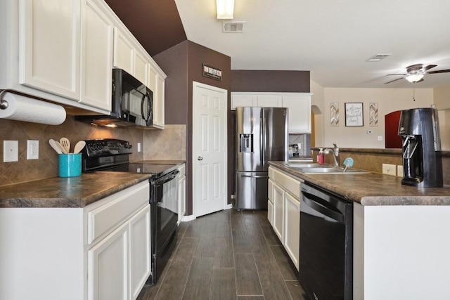 kitchen with black appliances, white cabinets, sink, ceiling fan, and tasteful backsplash