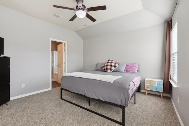 carpeted bedroom with ceiling fan and lofted ceiling