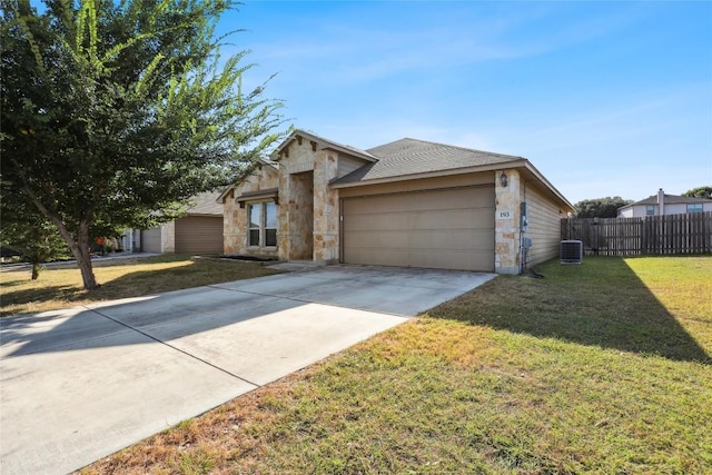 single story home with a front yard and central AC unit