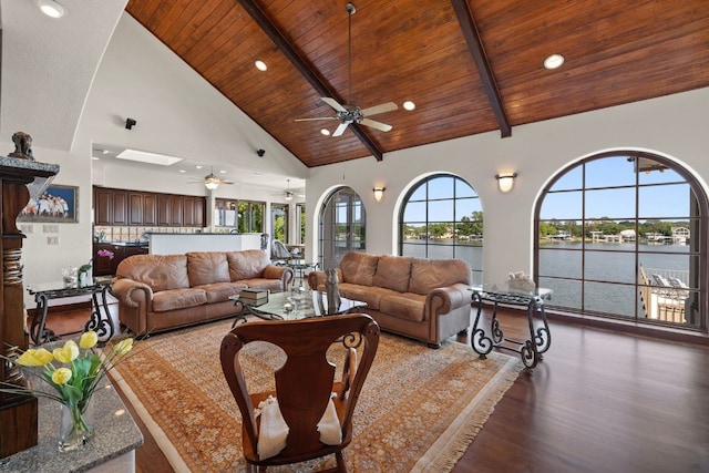 living room featuring high vaulted ceiling, a water view, dark hardwood / wood-style floors, beamed ceiling, and wood ceiling