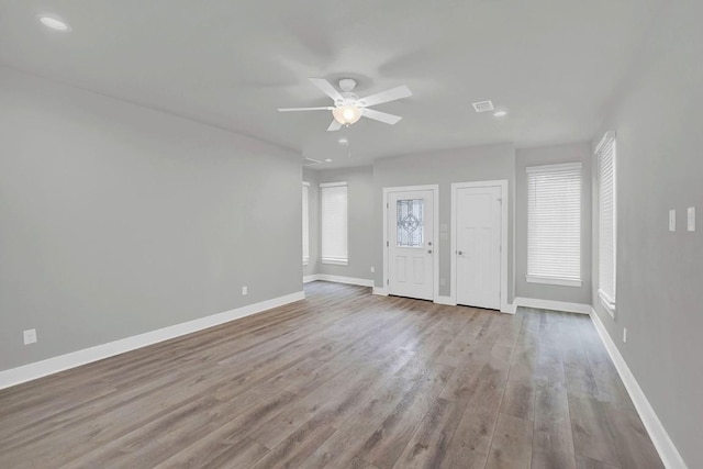 interior space featuring ceiling fan and light hardwood / wood-style floors