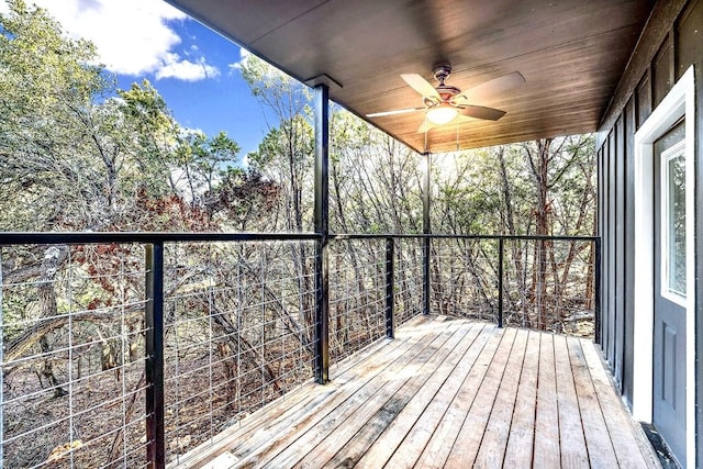 wooden deck with ceiling fan