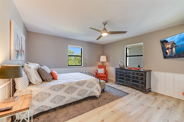 bedroom featuring light wood-type flooring and ceiling fan